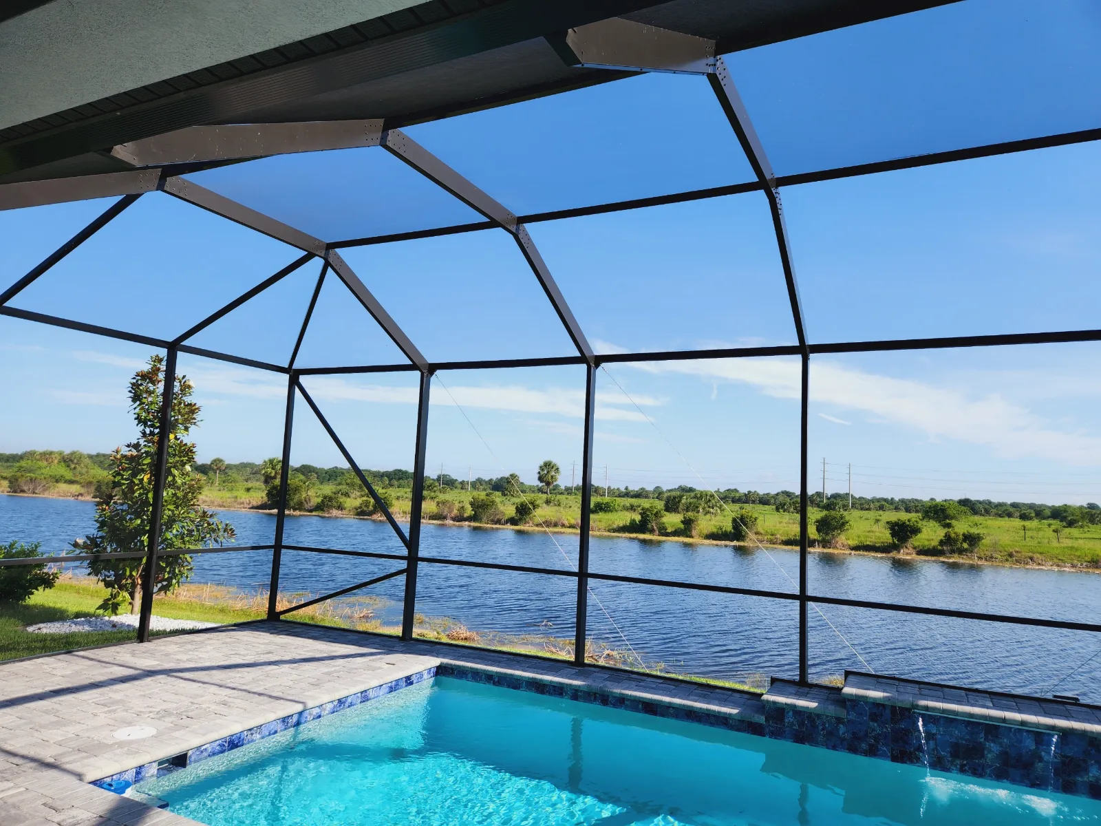 Custom aluminum pool screen enclosure built by All Aluminum & Screening in Brevard County, FL