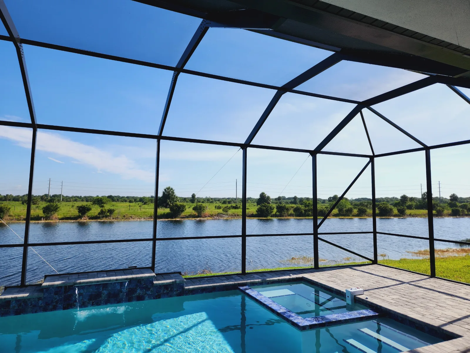 Custom aluminum pool screen enclosure built by All Aluminum & Screening in Brevard County, FL
