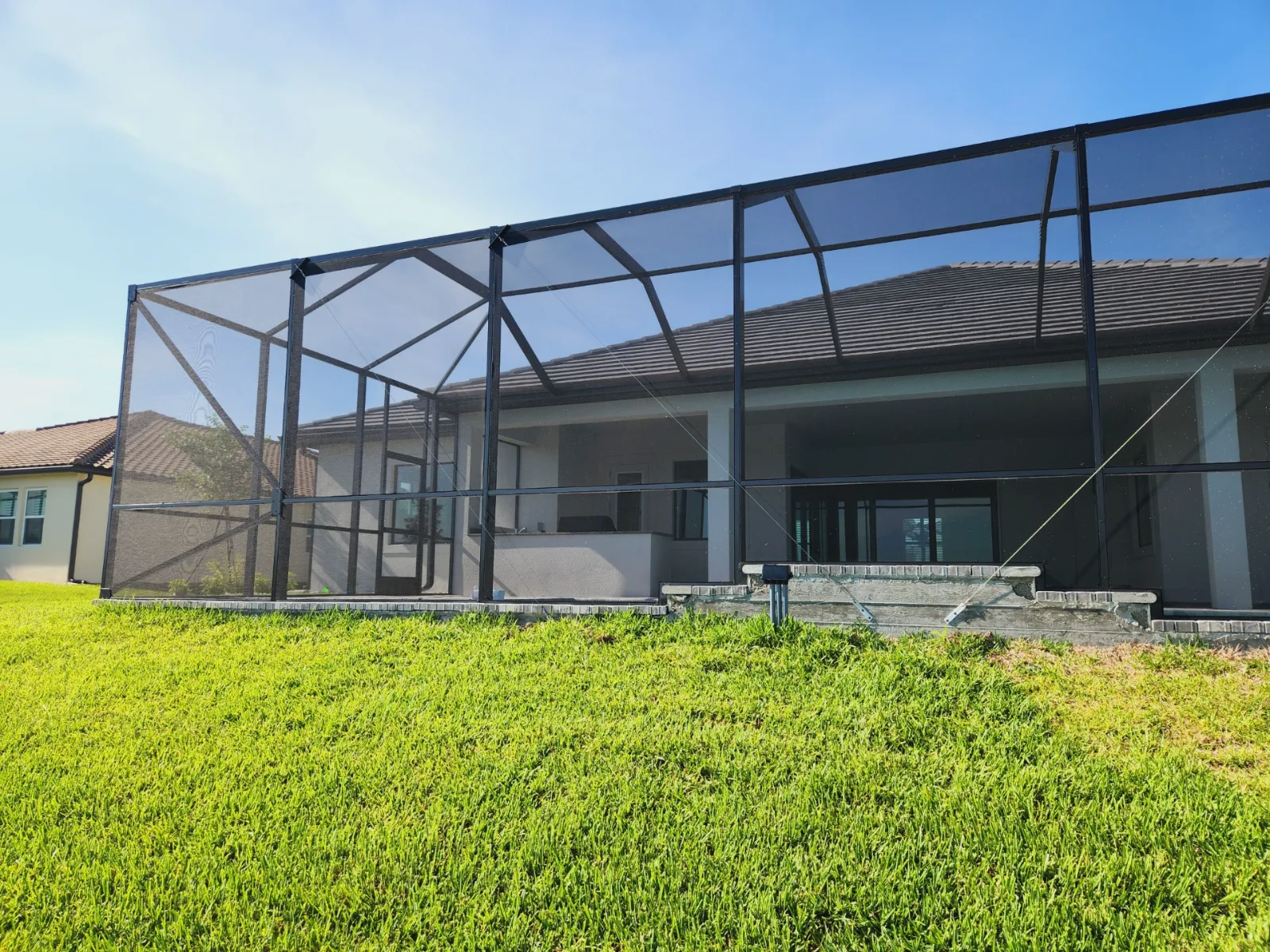 Custom aluminum pool screen enclosure built by All Aluminum & Screening in Brevard County, FL