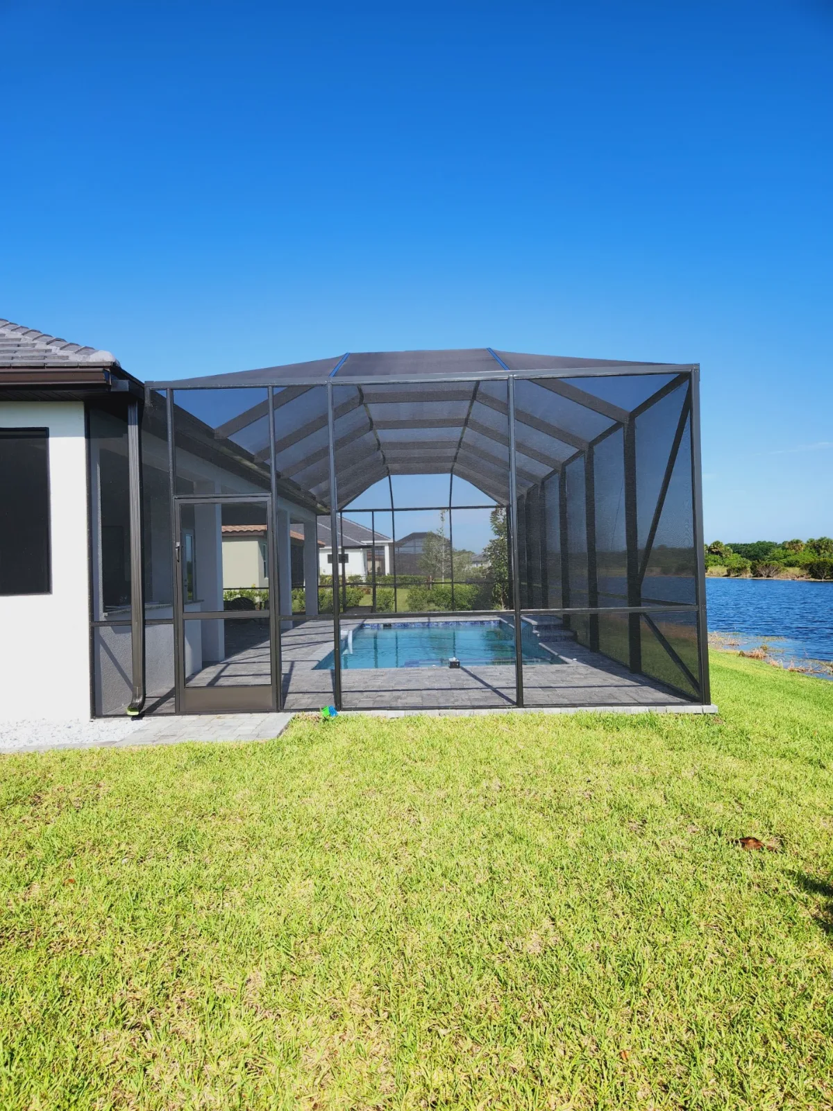 Custom aluminum pool screen enclosure built by All Aluminum & Screening in Brevard County, FL