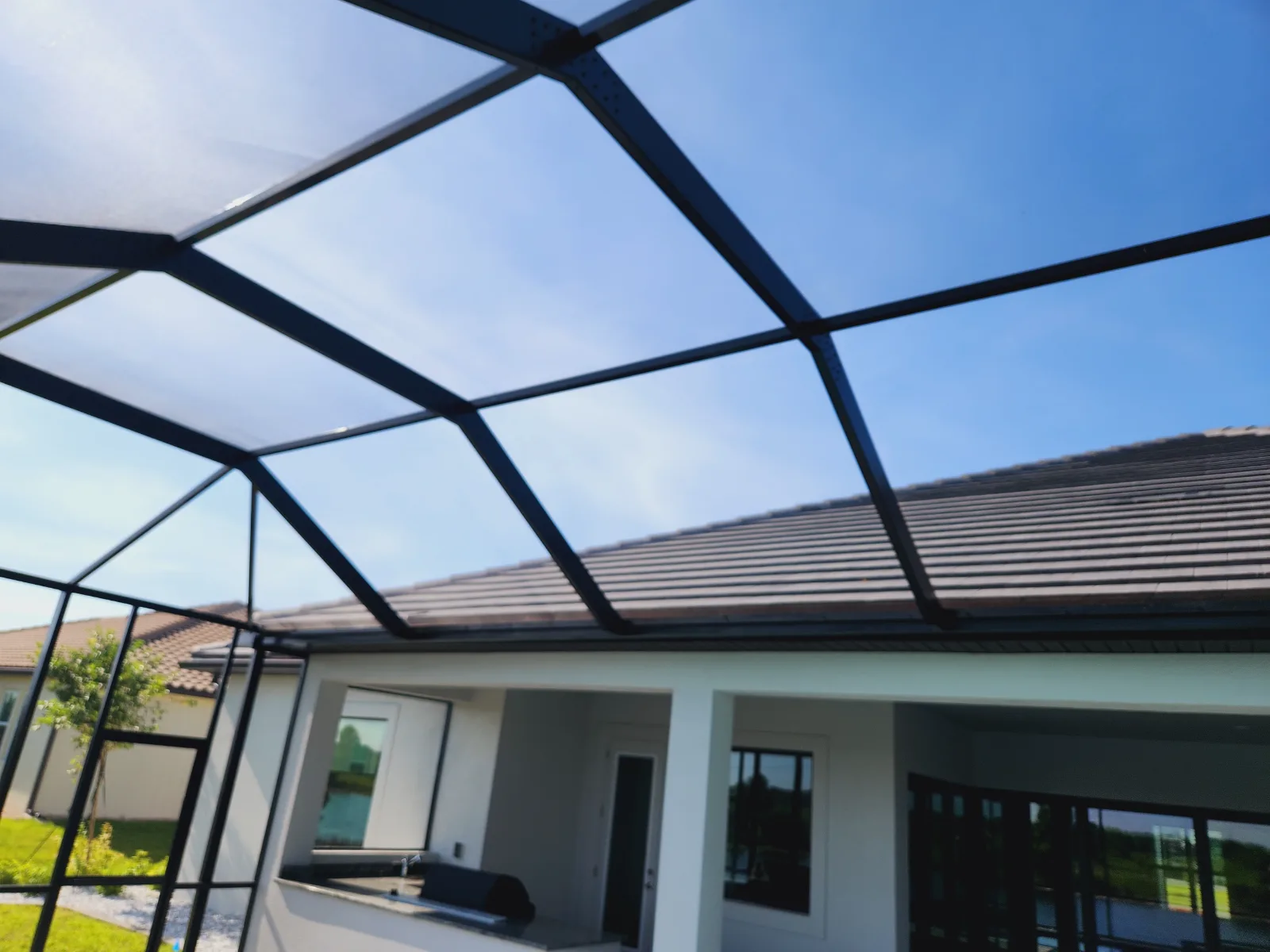 Custom aluminum pool screen enclosure built by All Aluminum & Screening in Brevard County, FL