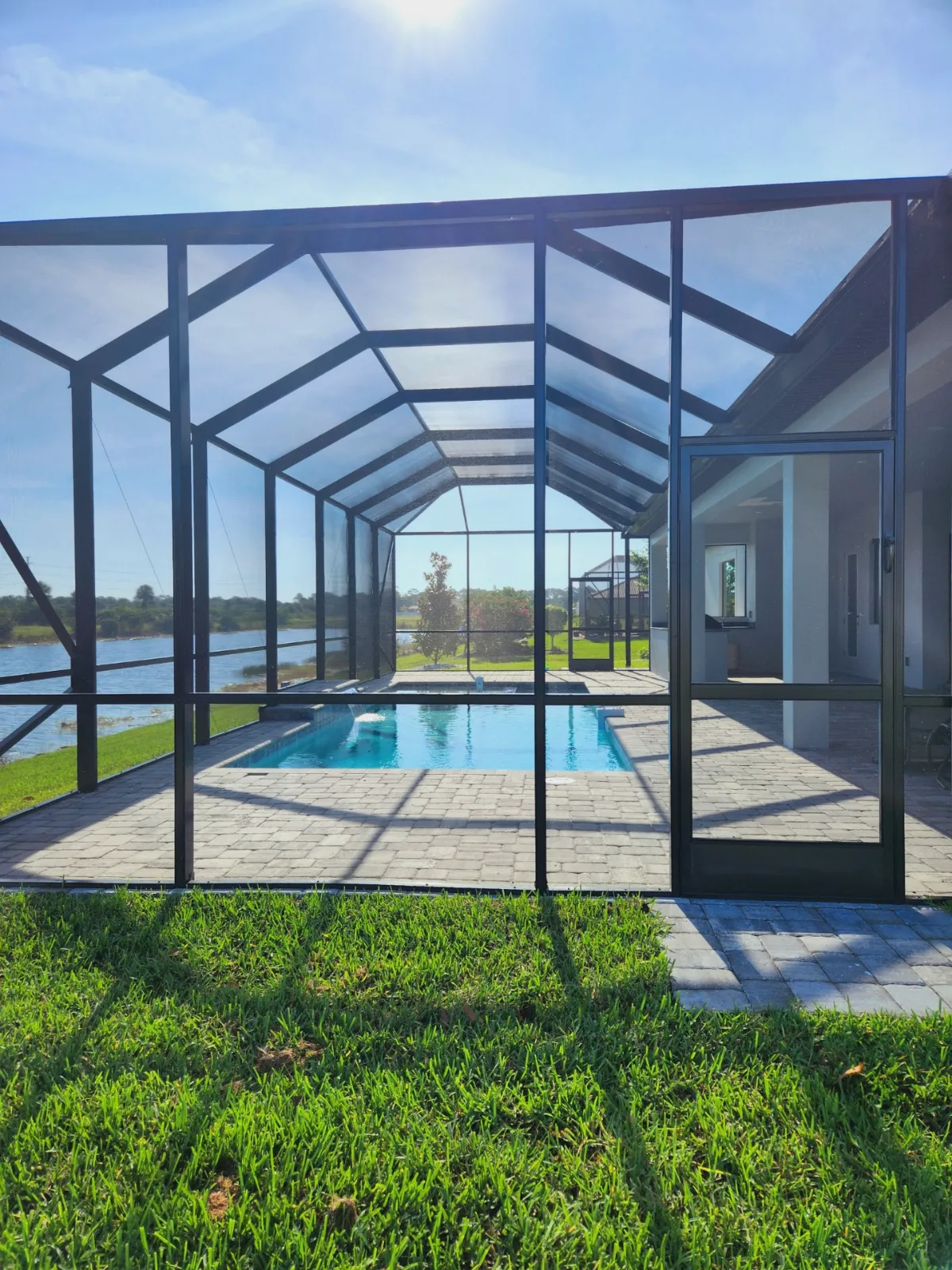 Custom aluminum pool screen enclosure built by All Aluminum & Screening in Brevard County, FL